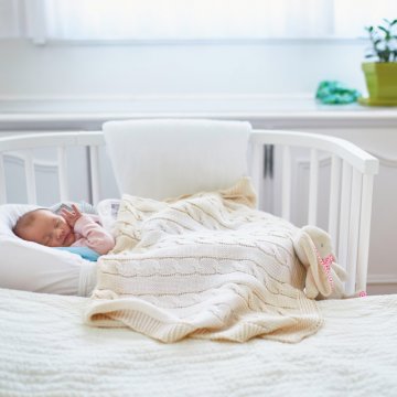 Baby sleeping in a crib